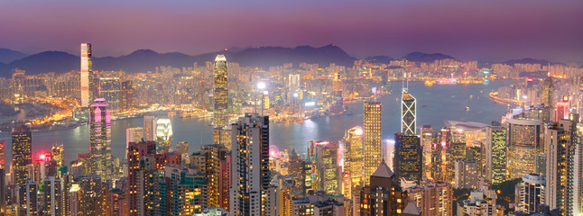 Naklejka premium Hong Kong skyline at sunset. Panorama