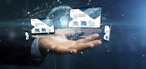 Businessman holding a Devices connected to a global business network 3d rendering