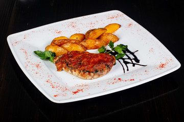 Roasted pork with tomato sauce