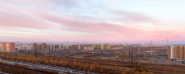Fototapeta premium autumn sunrise over city