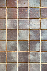 Brown ceramic tile background. Mosaic abstract pattern tiled.