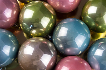Nice pastel Christmas balls close up. Top view.