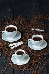 Coffee bean on wood and coffee cup is aroma