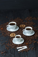 Obraz na płótnie Canvas Coffee bean on wood and coffee cup is aroma