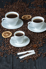 Coffee bean on wood and coffee cup is aroma
