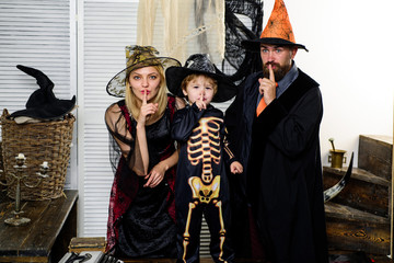 Terrible secret, a family secret. Halloween decoration and scary concept. Child skeleton posing on...