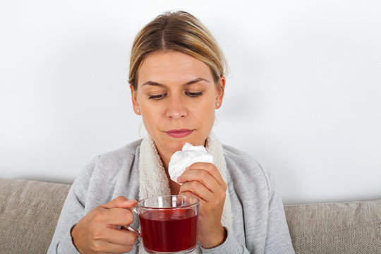 Sick Woman Drinking Tea