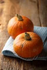 Ripe pumpkin on wooden desk