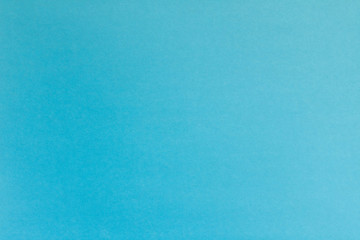 The texture of the cardboard is blue. Abstract blue background