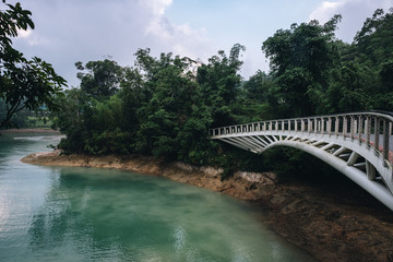 Beautiful landscape view of the blue-green lake with the bridge in Sun Moon lake in Taiwan