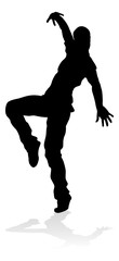 A male street dance hip hop dancer in silhouette