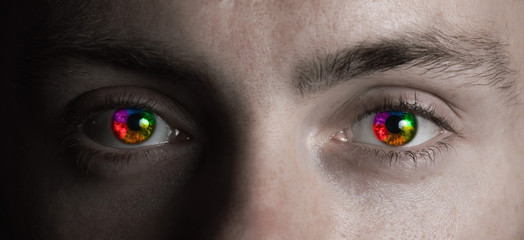 Surreal male rainbow eyes