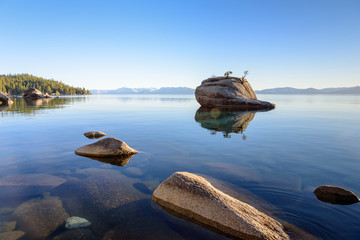 Bonsai Rock at Lake Tahoe with reflection from the Nevada side