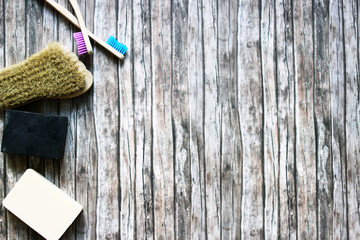 zero waste hygiene products on wooden background with copy space