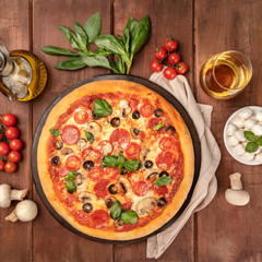 Pepperoni pizza with white wine, ingredients, and place for text
