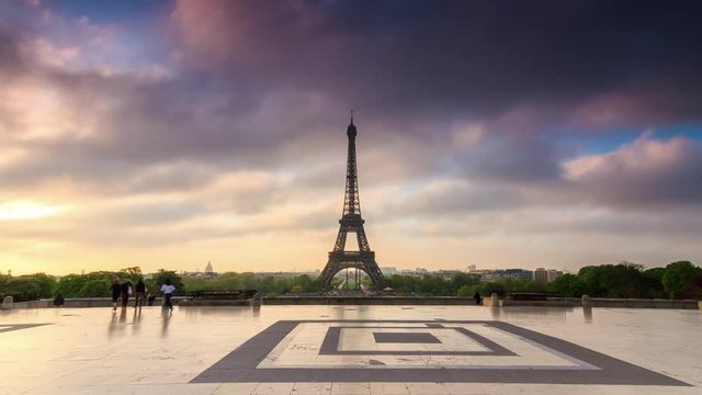 Beautiful 4K UHD timelapse (hyperlapse) of the Eiffel tower at sunrise in spring from Trocadero square in Paris, France