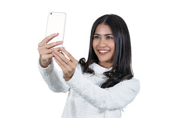 Portrait Asian woman taking selfie via technology smart mobile phone on white background, isolate include clipping path, fashion and lifestyle concept