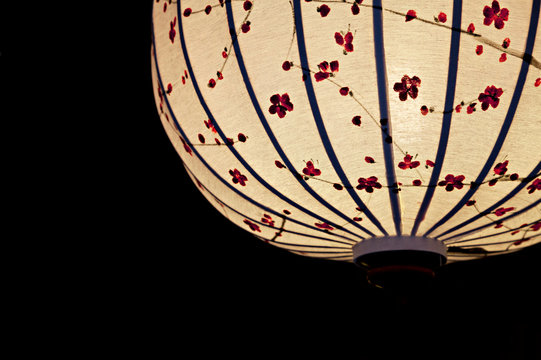 Fototapeta White Chinese lantern over black background