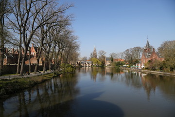 Fototapeta na wymiar Canal of Bruges with old traditional houses.