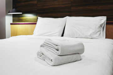 white clean towels on bed