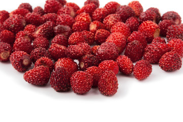 Heap wild ripe strawberry. Isolated on white