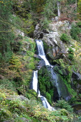 Fototapeta na wymiar TBaden-Wurttemberg, Germany-October 12, 2018: Triberger Waterfall, the highest waterfall in Germany, in Black Forest