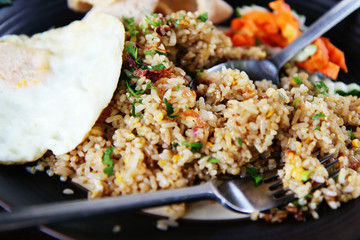 fried rice with chicken and vegetables - traditional indonesian food