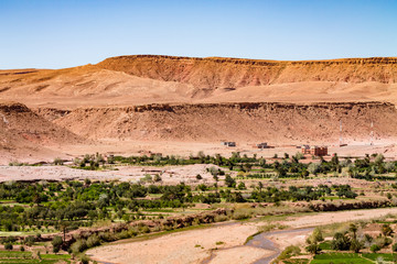 Traditional Berber city against the snowy Atlas Mountains. Africa Morocco Ait Ben Haddou