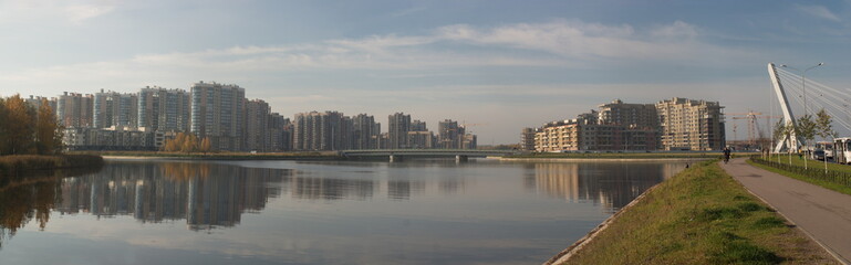 Panorama of new multi-storey residential buildings near the canal in the South-West of the city. St. Petersburg, Russia.