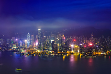 Fototapeta na wymiar Aerial view of illuminated Hong Kong skyline. Hong Kong, China