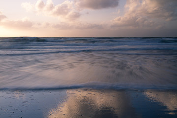 sunset at the beach with beautiful reflection