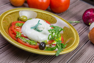burrata, fresh italian cheese and fresh vegetables