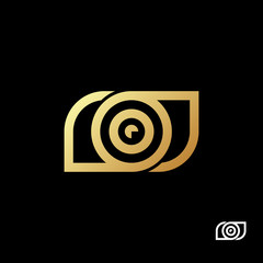 Creative geometric technical gold eyes logo template on black background. For medical centers and company. Modern surveillance technology. Vector illustration.