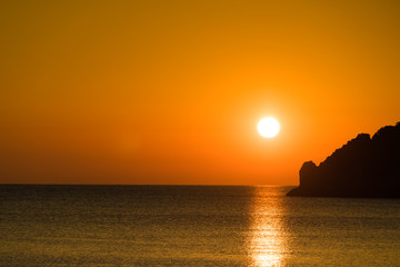 Obraz na płótnie Canvas Sunset or sunrise over sea surface