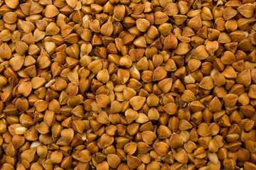 Dry buckwheat grains - brown texture