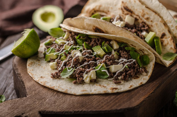 Homemade minced beef tortilla, fresh avocado and mozarella cheese