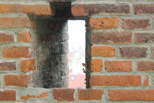 View of prague through brick window