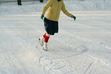 legs of a outdoors ice skater