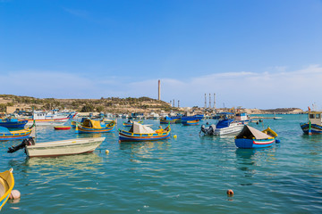 Fototapeta na wymiar Marsaxlokk, Malta. Boat Harbor