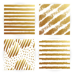 Set seamless pattern with gold and white striped. Hand drawn black and yellow paint strokes. Grunge style. Hand-drawn stripes, brush strokes, stars. Beautiful vector fashionable floral exotic