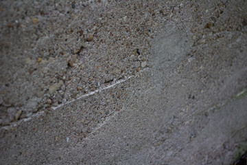Close up of the texture of an aged cement wall