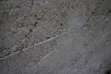 Close up of the texture of an aged cement wall