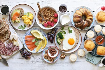Fotobehang Brunch. Family breakfast or brunch set served on rustic wooden table. Overhead view, copy space © losangela