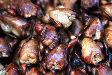 grilled quails in a pile