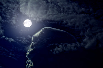Night sky, full moon, veil on the clouds