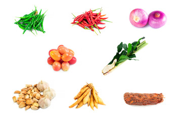 Top view and merging. Spices fresh vegetables set for cooking. Isolated on white background.