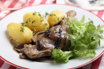 Roasted duck leg with vegetables