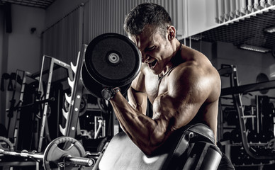 guy bodybuilder with dumbbell