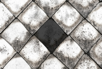 canvas stone gray cement rhombus in the center dark contrast part of the old roof windy covered with black spots base of the city