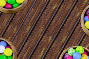 festive background design invitation baby colorful design set of blue green yellow sweets on a wooden brown background